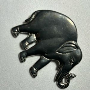 Elephant brooch.